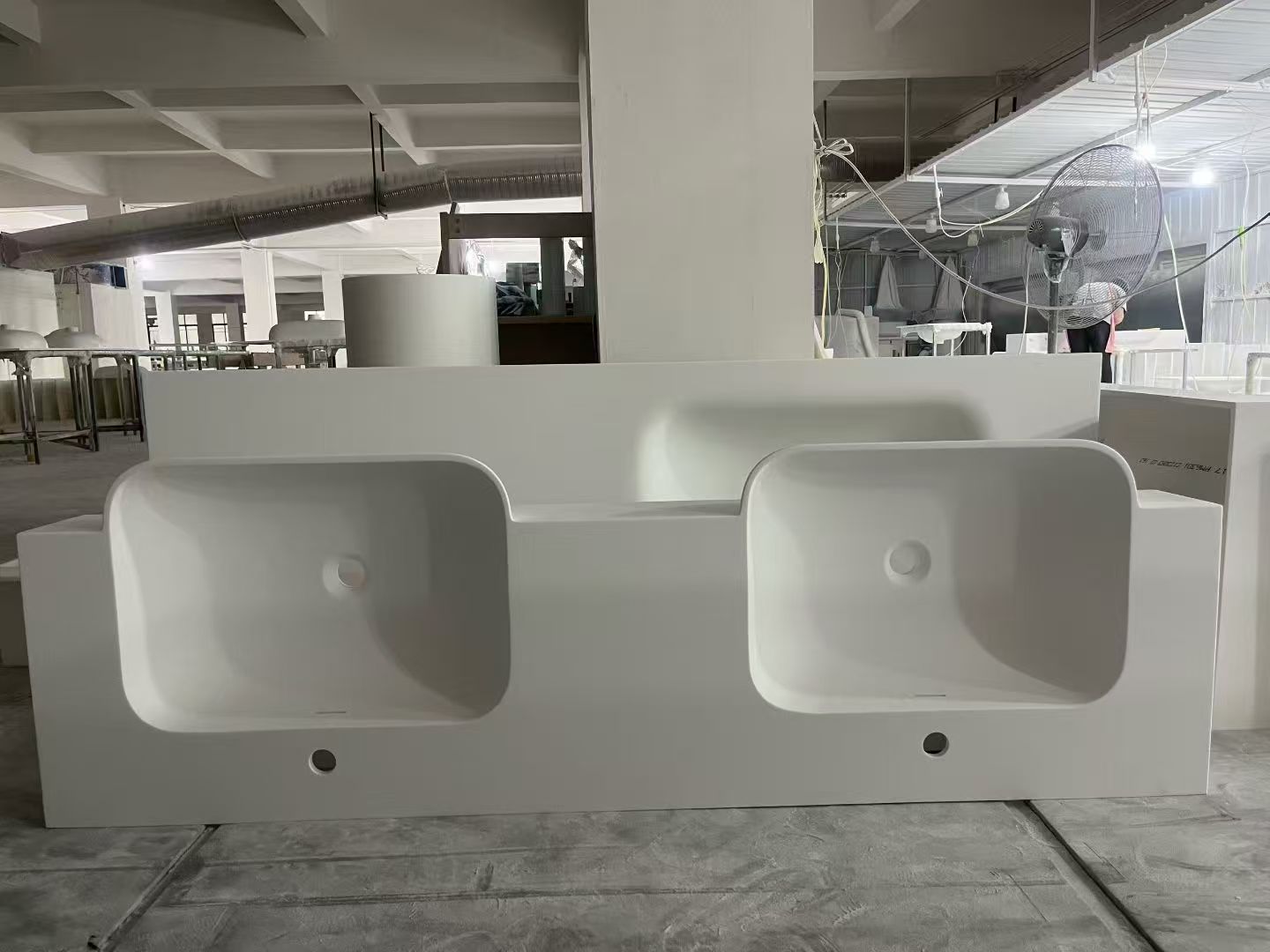 Custom solid surface basin production in workshop